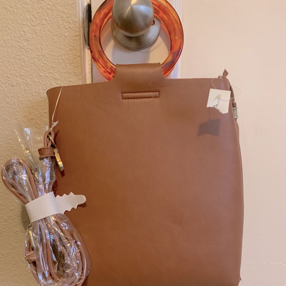 Suede hand bag with tags
